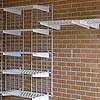 Fixed Garage Shelving with Adjustable Shelving supported by Garage Grids
